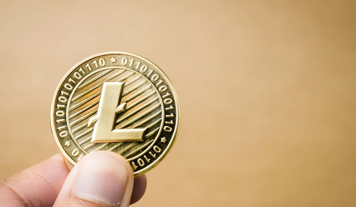 Man Holding Litecoin